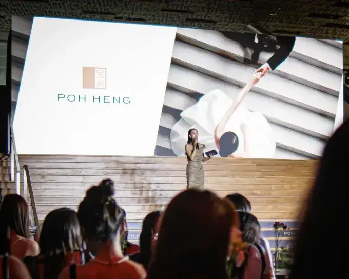 Host on stage at the V.O.W by Poh Heng launch